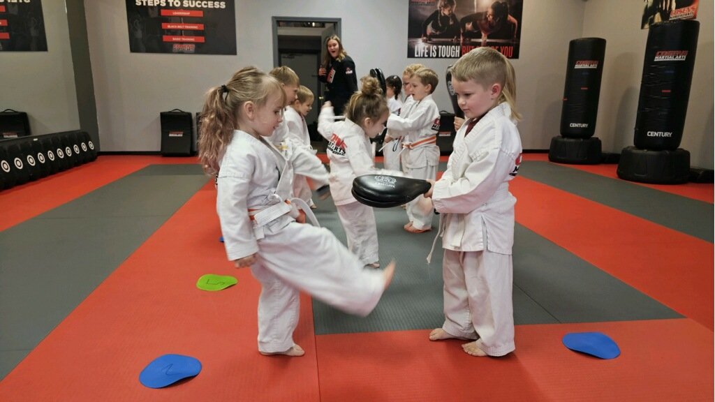 Kids practicing karate focus drills at Cosens Martial Arts in Lapeer, MI
