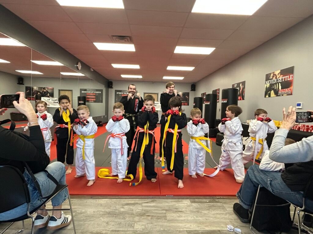 Lapeer students working together in martial arts class